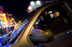 Constables Phil Gomes, right, and Mike Clark of the Integrated Gang Task Force on patrol in Vancouver's club district with orders to "disrupt and dismantle" drug gangs.